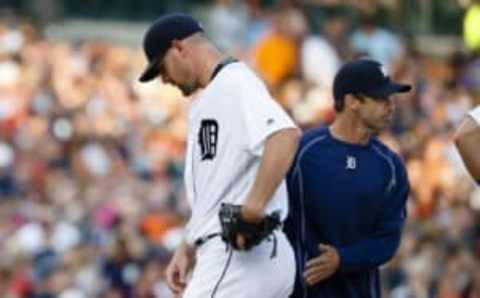 Jul 16, 2016; Detroit, MI, USA; Detroit Tigers manager Brad Ausmus (7) takes the ball to relieve starting pitcher Mike Pelfrey (37) in the second inning against the Kansas City Royals at Comerica Park. Mandatory Credit: Rick Osentoski-USA TODAY Sports