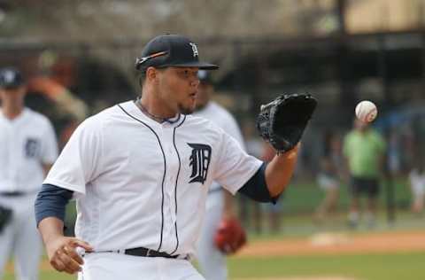 Feb 23, 2016; Lakeland, FL, USA; Detroit Tigers starting pitcher Joe Jimenez (77) catches a ball during the Detroit Tigers spring training camp at Joker Merchant Stadium. Mandatory Credit: Reinhold Matay-USA TODAY Sports