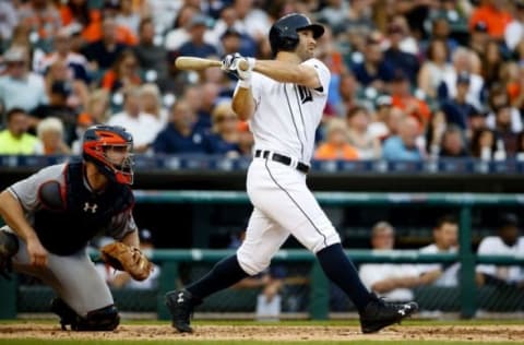 Jul 29, 2016; Detroit, MI, USA; Detroit Tigers left fielder Tyler Collins (18) hits a three run home run in the second inning against the Houston Astros at Comerica Park. Mandatory Credit: Rick Osentoski-USA TODAY Sports