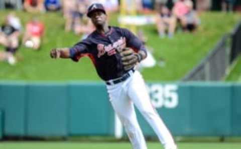 Mar 13, 2015; Lake Buena Vista, FL, USA; Atlanta Braves infielder Pedro Ciriaco (61) makes a throw to first base in the fourth inning of the spring training game against the Detroit Tigers at Champion Stadium. Mandatory Credit: Jonathan Dyer-USA TODAY Sports