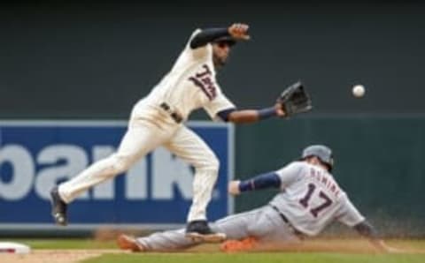 Apr 30, 2016; Minneapolis, MN, USA; Detroit Tigers pinch runner Andrew Romine (17) steals second base as Minnesota Twins shortstop Eduardo Nunez (9) fields the throw in the ninth inning at Target Field. The Tigers win 4-1. Mandatory Credit: Bruce Kluckhohn-USA TODAY Sports