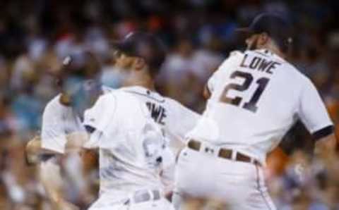 Jul 29, 2016; Detroit, MI, USA; (EDITORS NOTE: Multiple Exposure Image) Detroit Tigers relief pitcher Mark Lowe (21) pitches in the eighth inning against the Houston Astros at Comerica Park. Mandatory Credit: Rick Osentoski-USA TODAY Sports