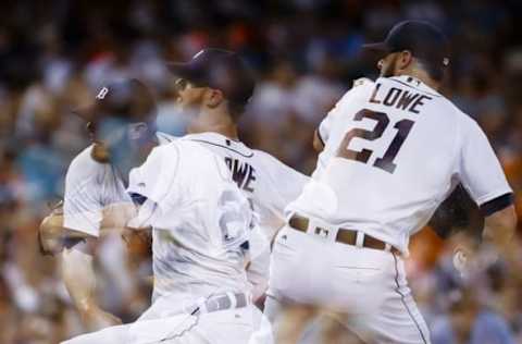 Jul 29, 2016; Detroit, MI, USA; (EDITORS NOTE: Multiple Exposure Image) Detroit Tigers relief pitcher Mark Lowe (21) pitches in the eighth inning against the Houston Astros at Comerica Park. Mandatory Credit: Rick Osentoski-USA TODAY Sports