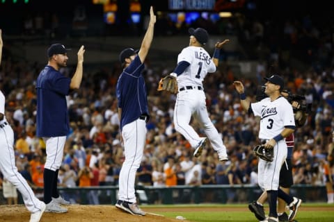 Aug 6, 2016; Detroit, MI, USA; Detroit Tigers starting pitcher Justin Verlander (35) and shortstop Jose Iglesias (1) celebrate after the game against the New York Mets at Comerica Park. Detroit won 5-6. Mandatory Credit: Rick Osentoski-USA TODAY Sports