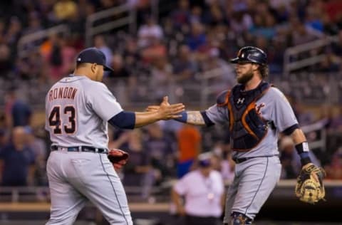 Aug 24, 2016; Minneapolis, MN, USA; Detroit Tigers relief pitcher Bruce Rondon (43) celebrates the win with catcher Jarrod Saltalamacchia (39) against the Minnesota Twins at Target Field. The Detroit Tigers beat the Minnesota Twins 9-4. Mandatory Credit: Brad Rempel-USA TODAY Sports