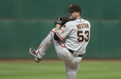 Sep 27, 2015; Oakland, CA, USA; San Francisco Giants starting pitcher Chris Heston (53) throws a pitch against the Oakland Athletics during the second inning at O.co Coliseum. Mandatory Credit: Ed Szczepanski-USA TODAY Sports