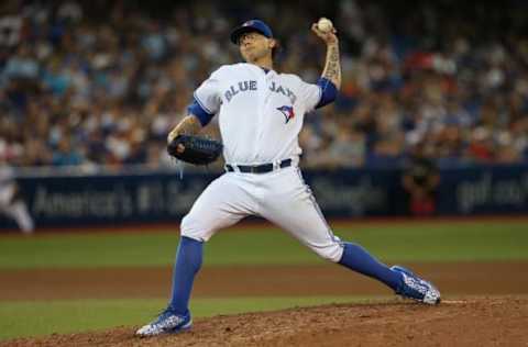 Jul 7, 2016; Toronto, Ontario, CAN; Toronto Blue Jays relief pitcher Brett Cecil (27) delivers a pitch against the Detroit Tigers in the seventh inning at Rogers Centre. Mandatory Credit: Kevin Sousa-USA TODAY Sports