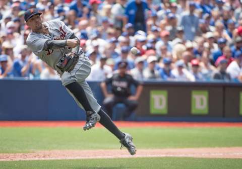 Jul 10, 2016; Toronto, Ontario, CAN; Detroit Tigers third baseman Nick Castellanos (9) throws a ball to first during the seventh inning in a game against the Toronto Blue Jays at Rogers Centre. The Toronto Blue Jays won 6-1. Mandatory Credit: Nick Turchiaro-USA TODAY Sports