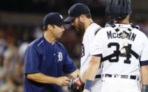 Aug 26, 2016; Detroit, MI, USA; Detroit Tigers manager Brad Ausmus (7) takes the ball to relieve starting pitcher Justin Verlander (35) in the eighth inning against the Los Angeles Angels at Comerica Park. Mandatory Credit: Rick Osentoski-USA TODAY Sports