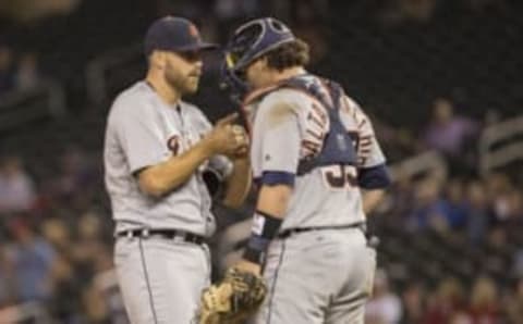 Sep 20, 2016; Minneapolis, MN, USA; Detroit Tigers catcher Jarrod Saltalamacchia (39) talks to starting pitcher Matt Boyd (48) during the eighth inning against the Minnesota Twins at Target Field. The Tigers won 8-1. Mandatory Credit: Jesse Johnson-USA TODAY Sports