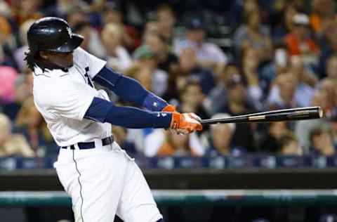 Sep 23, 2016; Detroit, MI, USA; Detroit Tigers center fielder Cameron Maybin (4) hits a two run home run in the fourth inning against the Kansas City Royals at Comerica Park. Mandatory Credit: Rick Osentoski-USA TODAY Sports