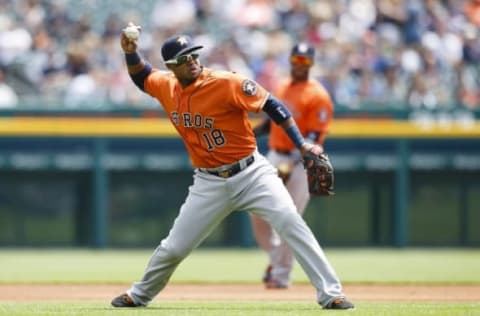 May 21, 2015; Detroit, MI, USA; Houston Astros third baseman Luis Valbuena (18) makes a throw to first to get Detroit Tigers center fielder Anthony Gose (not pictured) in the first inning at Comerica Park. Mandatory Credit: Rick Osentoski-USA TODAY Sports