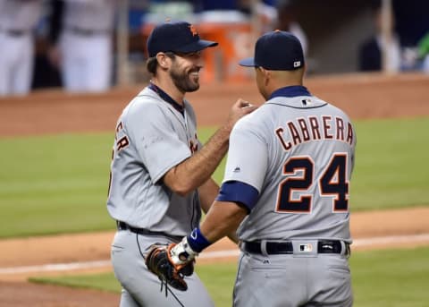 Apr 5, 2016; Miami, FL, USA; Detroit Tigers first baseman Miguel Cabrera (right) greets Tigers starting pitcher Justin Verlander (left) during the sixth inning against the Miami Marlins at Marlins Park. Mandatory Credit: Steve Mitchell-USA TODAY Sports