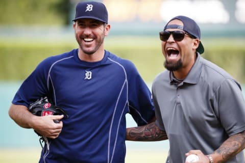 Jun 7, 2016; Detroit, MI, USA; Detroit Tigers former player Joel Zumaya laughs with Tigers starting pitcher Justin Verlander (35) after throwing out a ceremonial first pitch before a game against the Toronto Blue Jays at Comerica Park. Mandatory Credit: Rick Osentoski-USA TODAY Sports