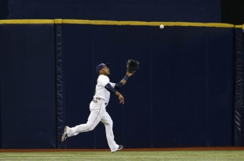 Aug 2, 2016; St. Petersburg, FL, USA; Tampa Bay Rays left fielder Desmond Jennings (8) catches a fly ball during the third inning against the Kansas City Royals at Tropicana Field. Mandatory Credit: Kim Klement-USA TODAY Sports