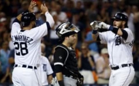 Aug 29, 2016; Detroit, MI, USA; Detroit Tigers catcher Jarrod Saltalamacchia (39) receives congratulations from right fielder J.D. Martinez (28) after he hits a two run home run in the eighth inning against the Chicago White Sox at Comerica Park. Mandatory Credit: Rick Osentoski-USA TODAY Sports