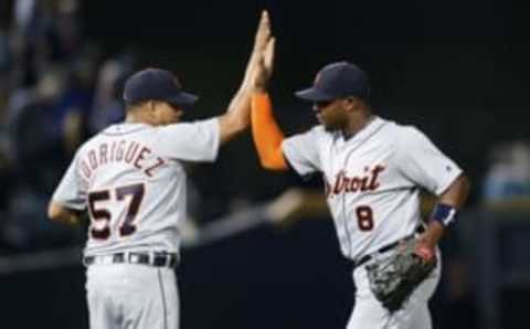 Sep 30, 2016; Atlanta, GA, USA; Detroit Tigers relief pitcher Francisco Rodriguez (57) and left fielder Justin Upton (8) celebrate a victory against the Atlanta Braves at Turner Field. The Tigers defeated the Braves 6-2. Mandatory Credit: Brett Davis-USA TODAY Sports