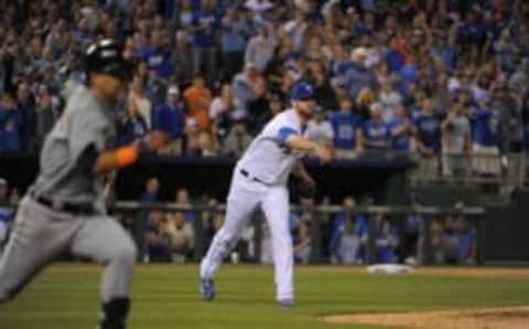 May 1, 2015; Kansas City, MO, USA; Royals relief pitcher Wade Davis (17) throws to first base on a grounder in the ninth against the Detroit Tigers at Kauffman Stadium. KC won the game 4-1. Mandatory Credit: John Rieger-USA TODAY SportsNationals.