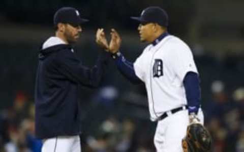 Apr 25, 2016; Detroit, MI, USA; Detroit Tigers starting pitcher Justin Verlander (35) and first baseman Miguel Cabrera (24) celebrate after the game against the Oakland Athletics at Comerica Park. Detroit won 7-3. Mandatory Credit: Rick Osentoski-USA TODAY Sports