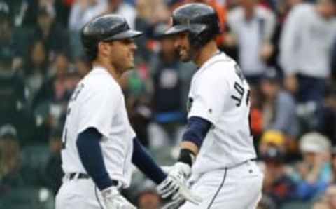 May 16, 2016; Detroit, MI, USA; Detroit Tigers second baseman Ian Kinsler (3) receives congratulations from right fielder J.D. Martinez (28) after he hits a home run in the first inning against the Minnesota Twins at Comerica Park. Mandatory Credit: Rick Osentoski-USA TODAY Sports