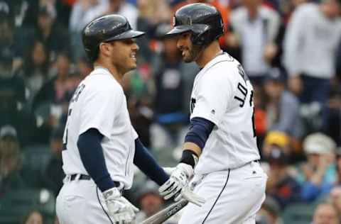 May 16, 2016; Detroit, MI, USA; Detroit Tigers second baseman Ian Kinsler (3) receives congratulations from right fielder J.D. Martinez (28) after he hits a home run in the first inning against the Minnesota Twins at Comerica Park. Mandatory Credit: Rick Osentoski-USA TODAY Sports