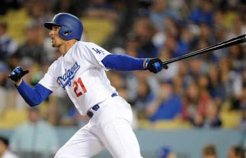 June 16, 2016; Los Angeles, CA, USA; Los Angeles Dodgers right fielder Trayce Thompson (21) hits a three run home run in the third inning against Milwaukee Brewers at Dodger Stadium. Mandatory Credit: Gary A. Vasquez-USA TODAY Sports