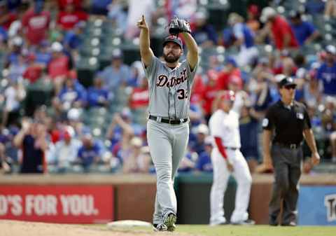 Aug 14, 2016; Arlington, TX, USA; Detroit Tigers starting pitcher Michael Fulmer (32) reacts to winning a complete game against the Texas Rangers at Globe Life Park in Arlington. Detroit Tigers won 7-0. Mandatory Credit: Tim Heitman-USA TODAY Sports