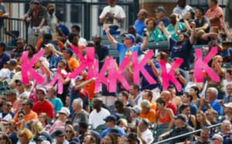 Aug 31, 2016; Detroit, MI, USA; Fan in right field seat hold up strikeout signs for Detroit Tigers starting pitcher Justin Verlander (not pictured) in the sixth inning against the Chicago White Sox at Comerica Park. Mandatory Credit: Rick Osentoski-USA TODAY Sports