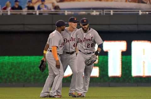 Sep 2, 2016; Kansas City, MO, USA; Detroit Tigers left fielder Justin Upton (8), third baseman JaCoby Jones (40), and right fielder J.D. Martinez (28) celebrates in the outfield after the win over the Kansas City Royals at Kauffman Stadium. The Tigers won 7-6. Mandatory Credit: Denny Medley-USA TODAY Sports