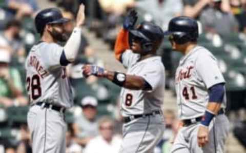 Sep 7, 2016; Chicago, IL, USA; Detroit Tigers left fielder Justin Upton (8) celebrates with designated hitter Victor Martinez (41) and right fielder J.D. Martinez (28) after hitting a three run home run against the Chicago White Sox during the second inning at U.S. Cellular Field. Mandatory Credit: Kamil Krzaczynski-USA TODAY Sports