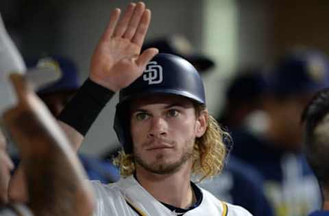 Sep 24, 2016; San Diego, CA, USA; San Diego Padres oinch runner Travis Jankowski (16) is congratulated after tying the game in the seventh inning against the San Francisco Giants at Petco Park. Mandatory Credit: Jake Roth-USA TODAY Sports