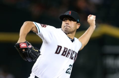 PHOENIX, AZ – JULY 20: Relief pitcher Jorge De La Rosa #29 of the Arizona Diamondbacks pitches against the Colorado Rockies during the ninth inning of an MLB game at Chase Field on July 20, 2018 in Phoenix, Arizona. (Photo by Ralph Freso/Getty Images)