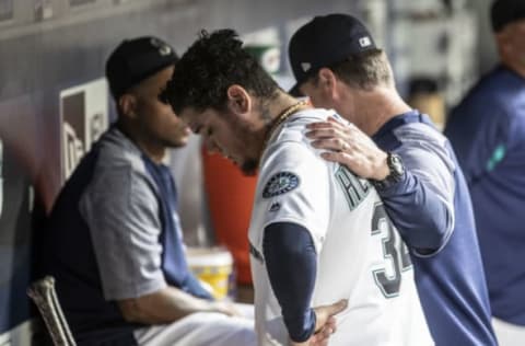 SEATTLE, WA – AUGUST 2: Starting pitcher Felix Hernandez #34 of the Seattle Mariners reacts after talking with manager Scott Servais after pitching five innings game of a game against the Toronto Blue Jays at Safeco Field on August 2, 2018 in Seattle, Washington. The Blue Jays won 7-3. (Photo by Stephen Brashear/Getty Images)