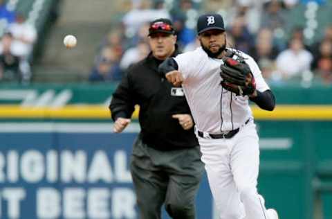 DETROIT, MI – SEPTEMBER 9: Shortstop Ronny Rodriguez #60 of the Detroit Tigers throws out Paul DeJong #12 of the St. Louis Cardinals at first base as second base umpire Tony Randazzo looks on during the second inning at Comerica Park on September 9, 2018 in Detroit, Michigan. (Photo by Duane Burleson/Getty Images)