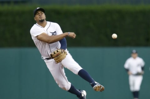 DETROIT, MI – SEPTEMBER 22: Jeimer Candelario #46 of the Detroit Tigers throws out Brian Goodwin of the Kansas City Royals at first base during the second inning at Comerica Park on September 22, 2018 in Detroit, Michigan. (Photo by Duane Burleson/Getty Images)