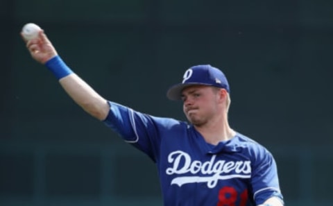 GLENDALE, ARIZONA – FEBRUARY 25: Gavin Lux #81 of the Los Angeles Dodgers warms up before the MLB spring training game against the Chicago Cubs at Camelback Ranch on February 25, 2019 in Glendale, Arizona. (Photo by Christian Petersen/Getty Images)