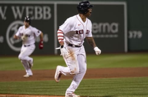 BOSTON, MA – SEPTEMBER 1: Rafatel Devers #11 of the Boston Red Sox reacts as he scores the game winning run on a walk-off single by Rob Refsnyder #30 during the ninth inning of a game against the Texas Rangers on September 1, 2022 at Fenway Park in Boston, Massachusetts. (Photo by Billie Weiss/Boston Red Sox/Getty Images)