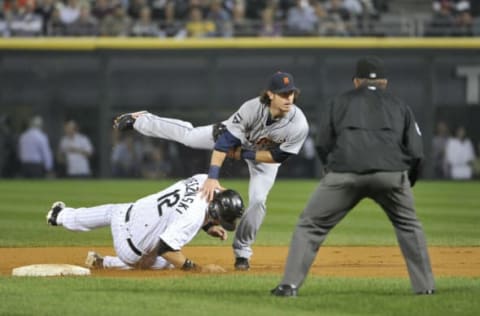 CHICAGO, IL – SEPTEMBER 13: A. J. Pierzynski #13 of the Chicago White Sox slides into second baseman Will Rhymes #28 of the Detroit Tigers as he turns a double play during the first inning at U.S. Cellular Field on September 13, 2011 in Chicago, Illinois. (Photo by Brian Kersey/Getty Images)