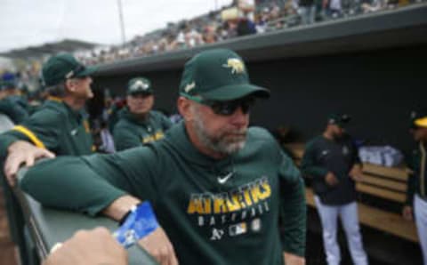 MESA, AZ – February 23: Quality Control Coach Mark Kotsay #7 of the Oakland Athletics stands in the dugout prior to the game against the San Francisco Giants at Hohokam Stadium on February 23, 2020 in Mesa, Arizona. (Photo by Michael Zagaris/Oakland Athletics/Getty Images)