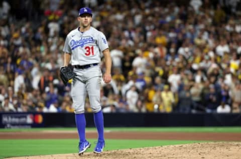 SAN DIEGO, CALIFORNIA – OCTOBER 15: Tyler Anderson #31 of the Los Angeles Dodgers reacts after throwing out Ha-Seong Kim #7 of the San Diego Padres (not pictured) to end the fifth inning in game four of the National League Division Series at PETCO Park on October 15, 2022 in San Diego, California. (Photo by Harry How/Getty Images)