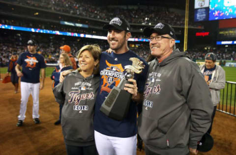 Justin Verlander poses for a photo with the American League Championship trophy. (Photo by Jonathan Daniel/Getty Images)