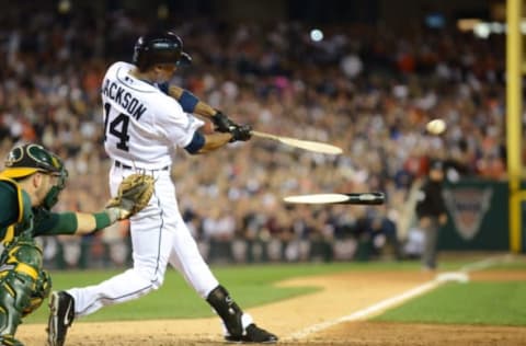 DETROIT, MI – Austin Jackson hits a go-ahead RBI single in the seventh inning of Game Four of the American League Division Series. (Photo by Mark Cunningham/MLB Photos via Getty Images)