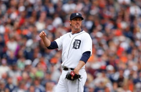 Joe Nathan looks to first base. (Photo by Leon Halip/Getty Images)