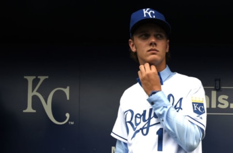 Number one draft pick Ashe Russell watches the Royals take batting practice. (Photo by Ed Zurga/Getty Images)