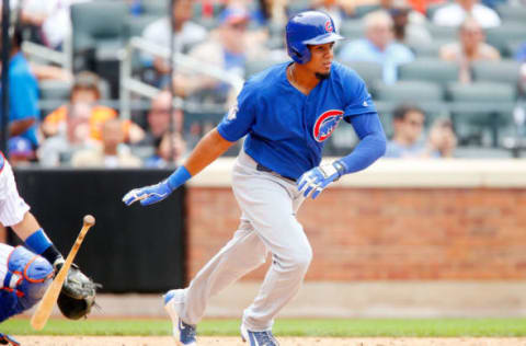 NEW YORK, NY – JULY 03: Jeimer Candelario #7 of the Chicago Cubs follows through on a seventh inning base hit against the New York Mets at Citi Field on July 3, 2016 in the Flushing neighborhood of the Queens borough of New York City. The hit was Candelario’s first in the major leagues. (Photo by Jim McIsaac/Getty Images)