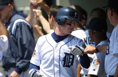 24 Jun 2001: Robert Fick #25 of the Detroit Tigers enters the dugout in the game against the Minnesota Twins at Comercia Park in Detroit, Michigan. The Twins won the game 14-5. DIGITAL IMAGE. Mandatory Credit : Tom Pidgeon/Allsport