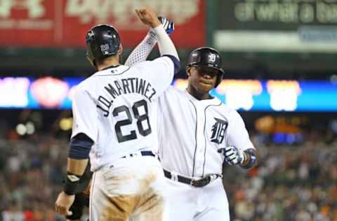 DETROIT, MI – AUGUST 27: Justin Upton #8 of the Detroit Tigers celebrates after hitting a two run home run to left field scoring teammate J.D. Martinez #28 during the sixth inning of the game against the Los Angeles Angels on August 27, 2016 at Comerica Park in Detroit, Michigan. (Photo by Leon Halip/Getty Images)