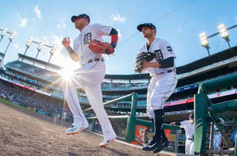 DETROIT, MI – JUNE 07: Jose Iglesias #1 (L) and Alex Presley #14 of the Detroit Tigers take the field to start the MLB game against the Los Angeles Angels at Comerica Park on June 7, 2017 in Detroit, Michigan. (Photo by Dave Reginek/Getty Images)