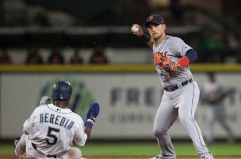 SEATTLE, WA – JUNE 19: Shortstop Jose Iglesias #1 of the Detroit Tigers turns the double play after forcing out Guillermo Heredia #5 of the Seattle Mariners at second base on a ball hit by Nelson Cruz #23 of the Seattle Mariners during the seventh inning of a game at Safeco Field on June 19, 2017 in Seattle, Washington. The Mariners won the game 6-2. (Photo by Stephen Brashear/Getty Images)