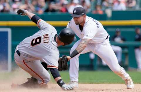 DETROIT, MI – JULY 6: Brandon Belt #9 of the San Francisco Giants makes a hit a double, beating the tag from third baseman Nicholas Castellanos #9 of the Detroit Tigers coving at second base, during the sixth inning at Comerica Park on July 6, 2017 in Detroit, Michigan. (Photo by Duane Burleson/Getty Images)